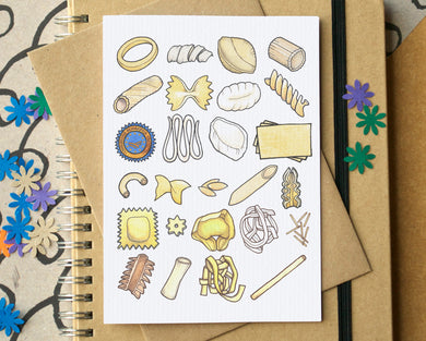 Notebook with a greetings card featuring pasta illustrations on top
